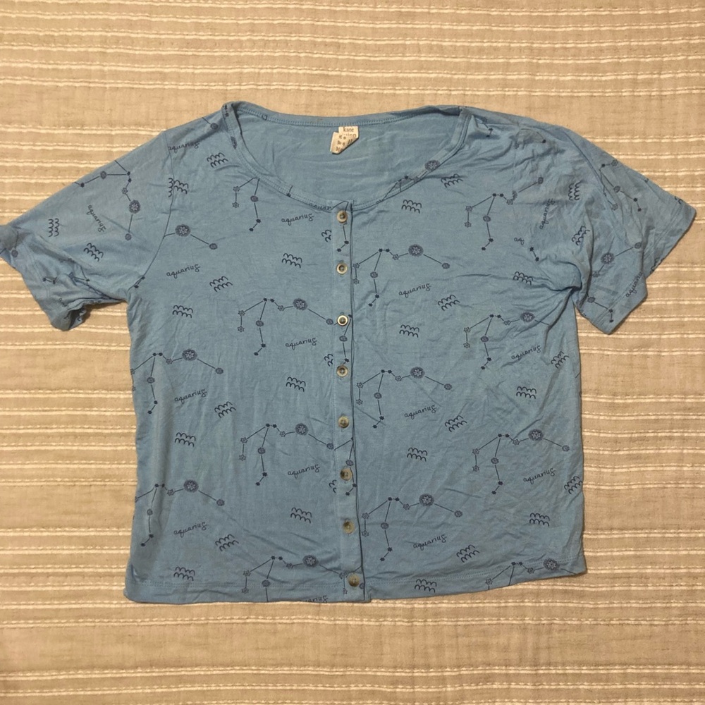 Kate Quinn Aquarius top